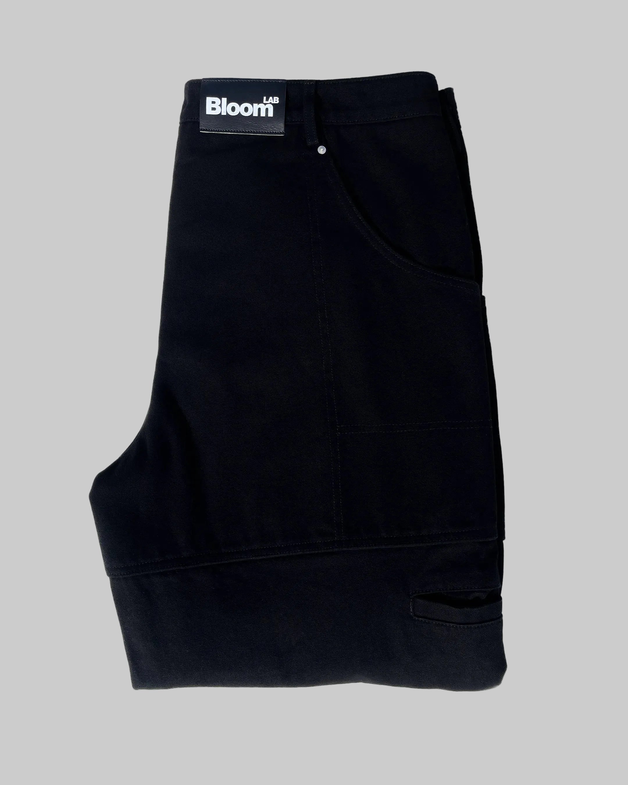 black folded jeans